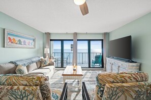 Living area - Commodore Resort by Book That Condo (Panama City Beach)