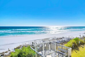 A beach view with a wooden deck and a fence. - 🌞Beach House 201A - Salt Water Retreat | Gulf Views + Seasonal Beach Service🌞 (Miramar Beach)
