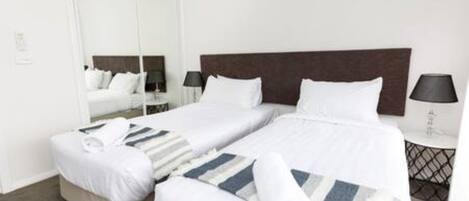 2 slaapkamers, een strijkplank/strijkijzer, gratis wifi, beddengoed