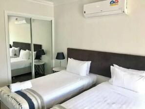 2 habitaciones, tabla de planchar con plancha y wifi gratis