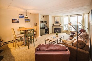 Condo, Multiple Beds (Pinnacle F8) | Living room | TV, fireplace