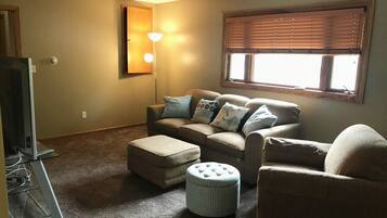 Apartment (Updated and cozy 2-Bedroom in Rochest) | Living room | TV