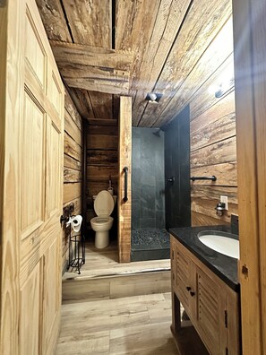 Combined shower/tub, hair dryer, towels, toilet paper - Honey Moon Hideaway Log Cabin  -Pigeon Forge, Hot Tub-Pool-Fishing (Sevierville)