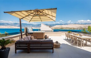 Outdoor dining - Villa Soulhouse - sea views, luxury, comfort and style by MyWaycation (Pag)