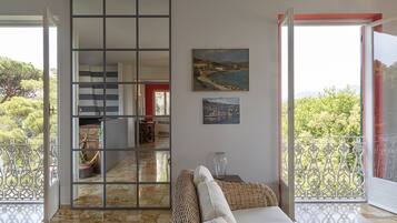 Apartment, 4 Bedrooms | Living area | Flat-screen TV