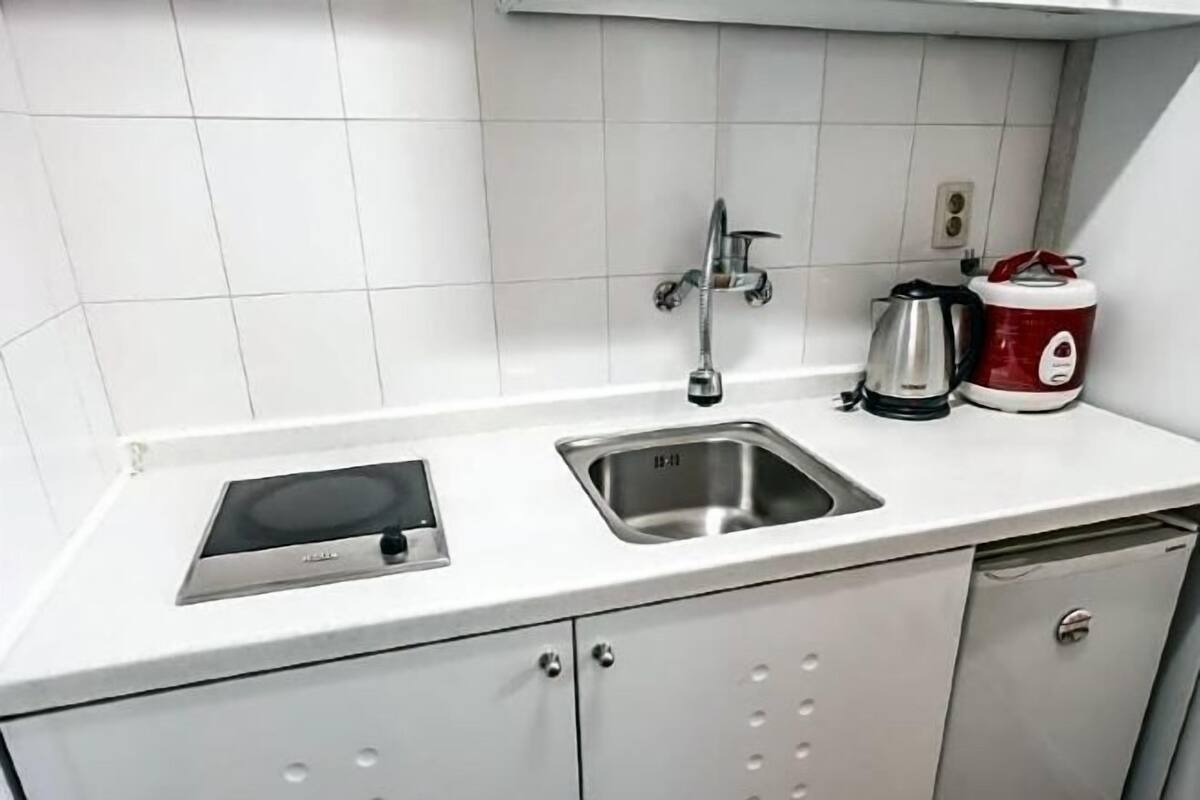 Private kitchen | Mini-fridge, microwave (on request), stovetop, rice cooker