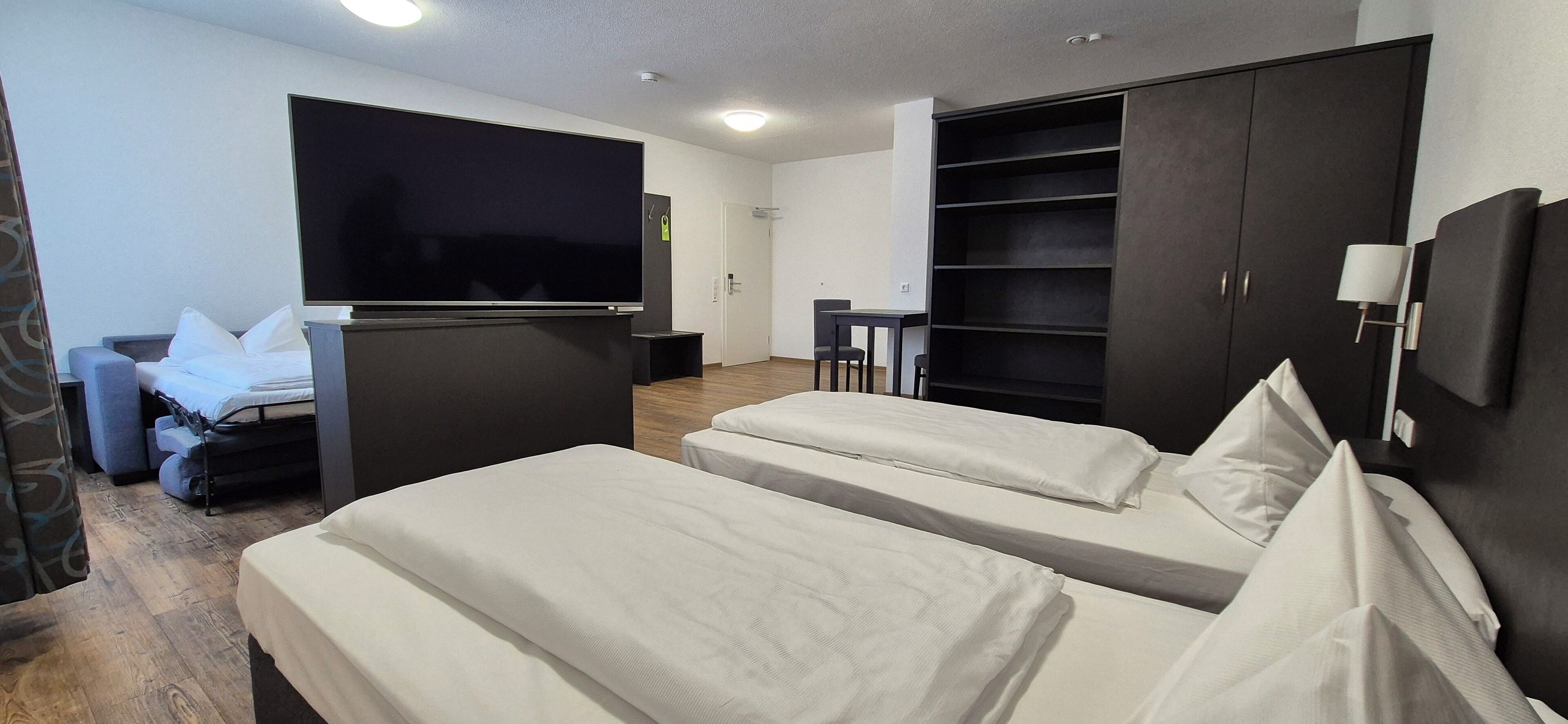 Hypo-allergenic bedding, desk, laptop workspace, soundproofing