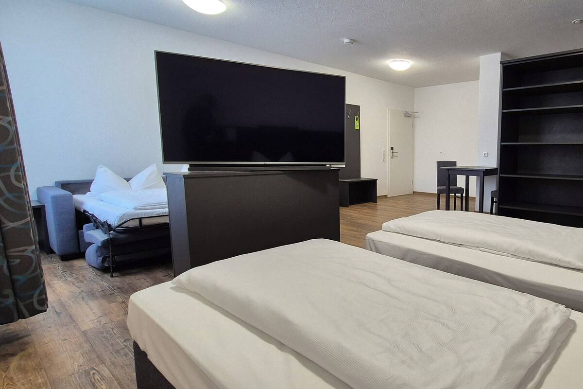 Hypo-allergenic bedding available, desk, laptop workspace, soundproofing