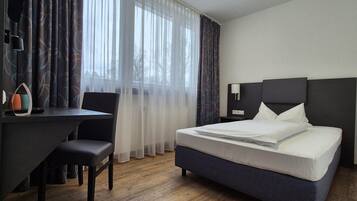 Hypo-allergenic bedding, desk, laptop workspace, soundproofing
