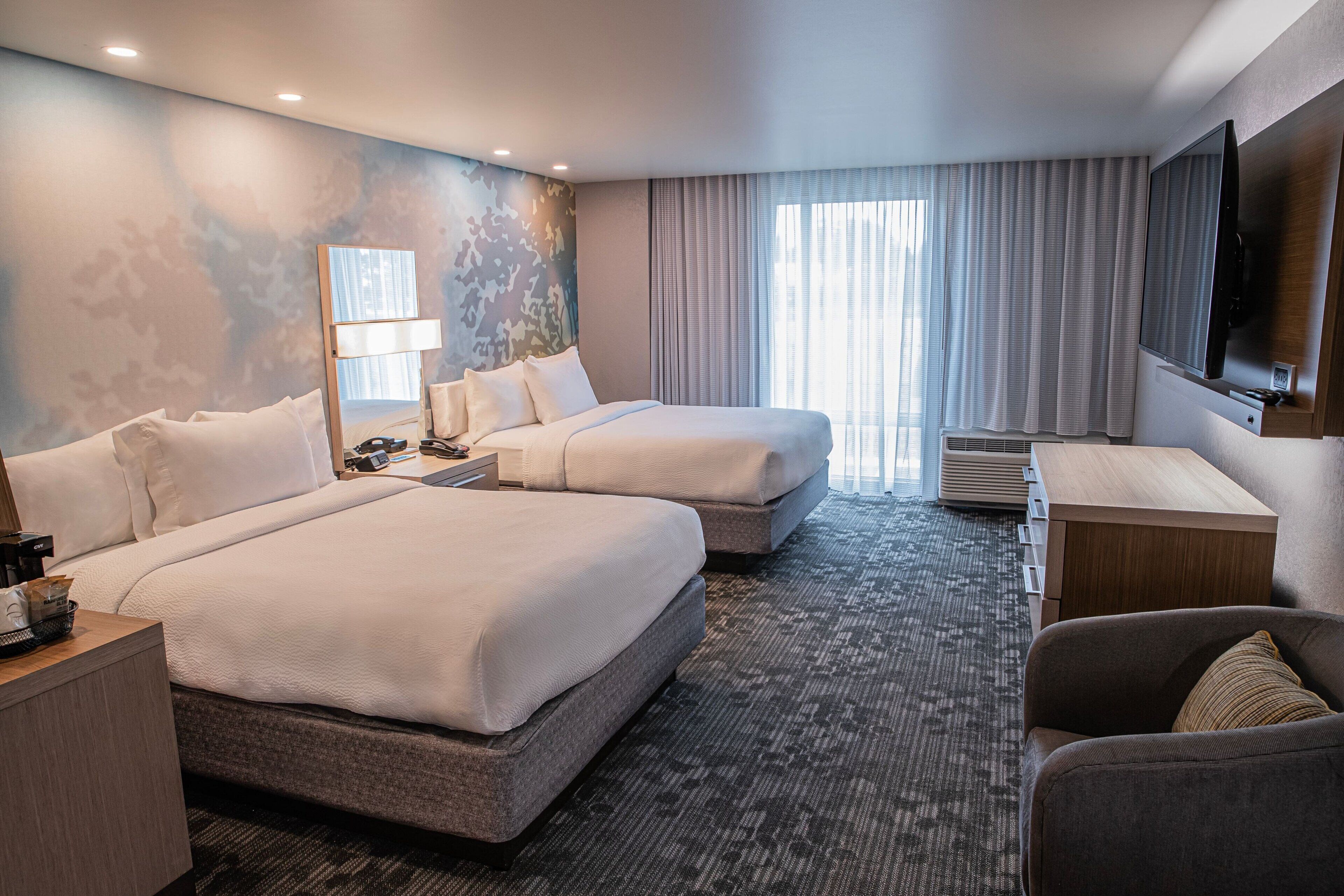 desk, blackout curtains, iron/ironing board, free cots/infant beds