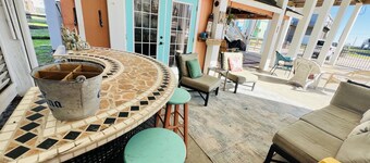 Home with beach view from front porch, only two minute walk to beach. Very Nice!