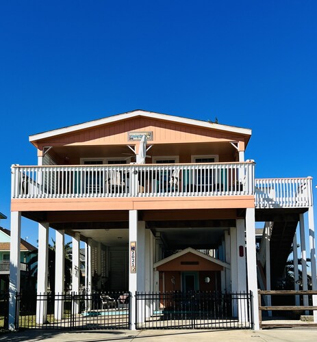 Home with beach view from front porch, only two minute walk to beach. Very Nice!