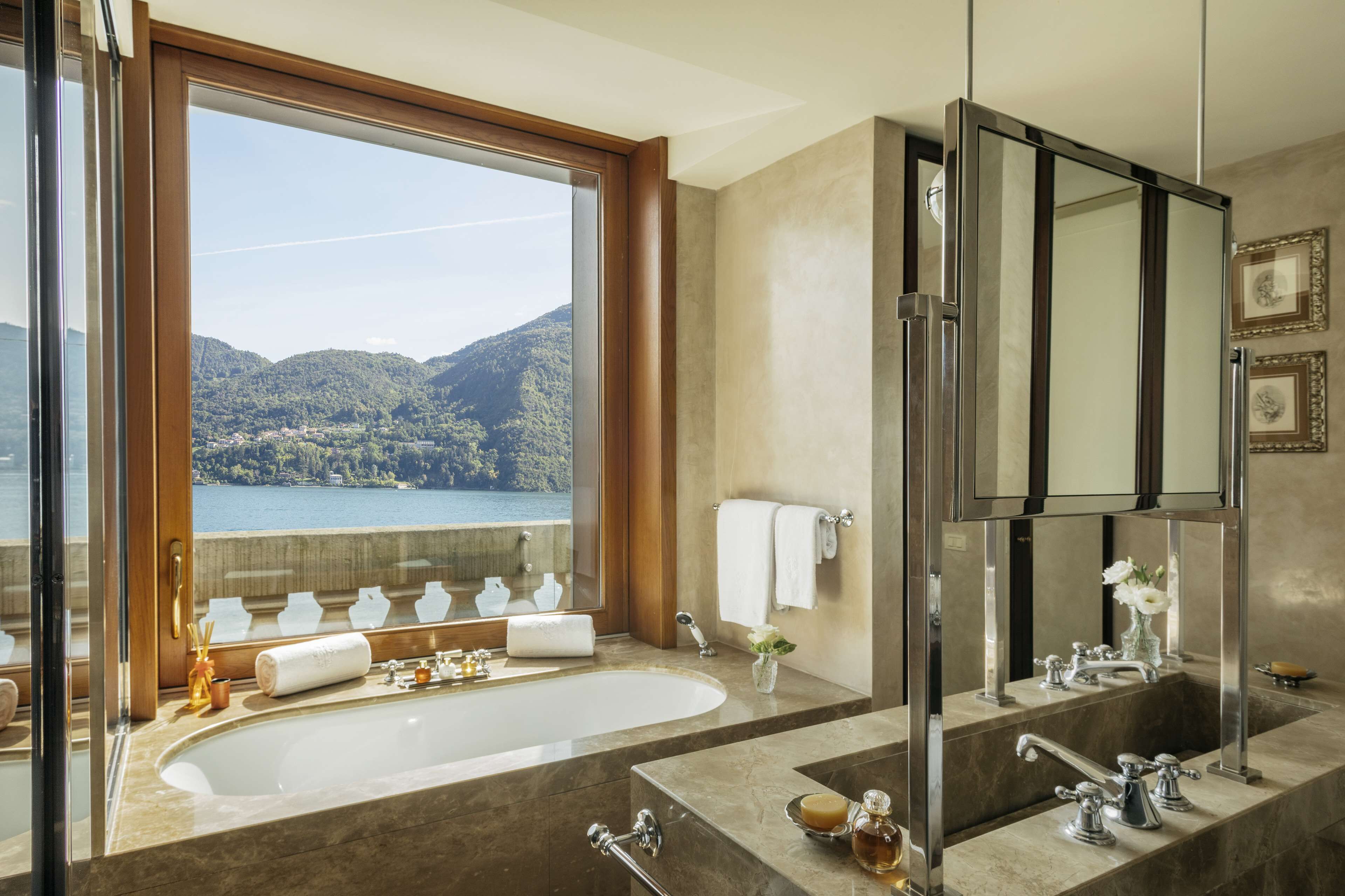 rooftop corner suite | bathroom | designer toiletries, hair dryer, bathrobes, slippers