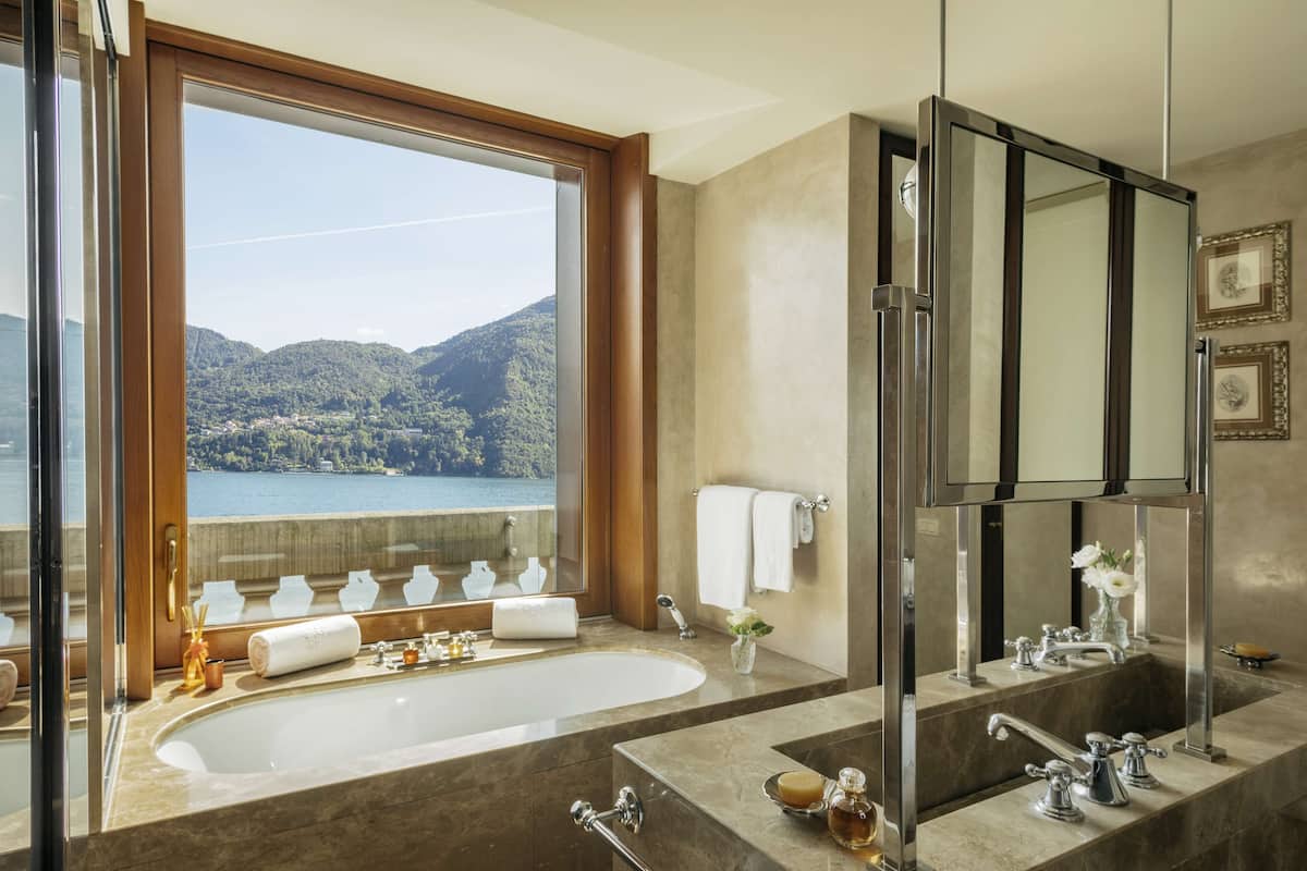 rooftop corner suite | bathroom | designer toiletries, hair dryer, bathrobes, slippers