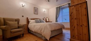 Departamento | 1 habitación, tabla de planchar con plancha, wifi gratis y ropa de cama