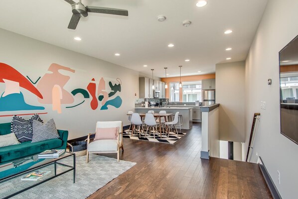Business Townhome, Non Smoking | Living area | 60-inch Smart TV with digital channels, TV, streaming services - Visually Stunning 2BR 1.5BA Near Downtown ~ Balcony w/ City View (Nashville)