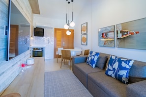 Family Apartment | Living area | Flat-screen TV - Apartamento beira mar - OKA Beach Resort (Ipojuca)