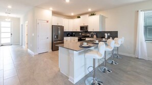 House, Multiple Beds, Private Pool, Pool View | Private kitchen | Coffee/tea maker, fridge, stovetop, dishwasher - Beautiful 8Bd Pool Spa Gm Hmchampions Gate-8890ccd (Davenport)