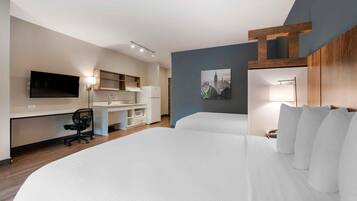 Premium bedding, desk, laptop workspace, iron/ironing board