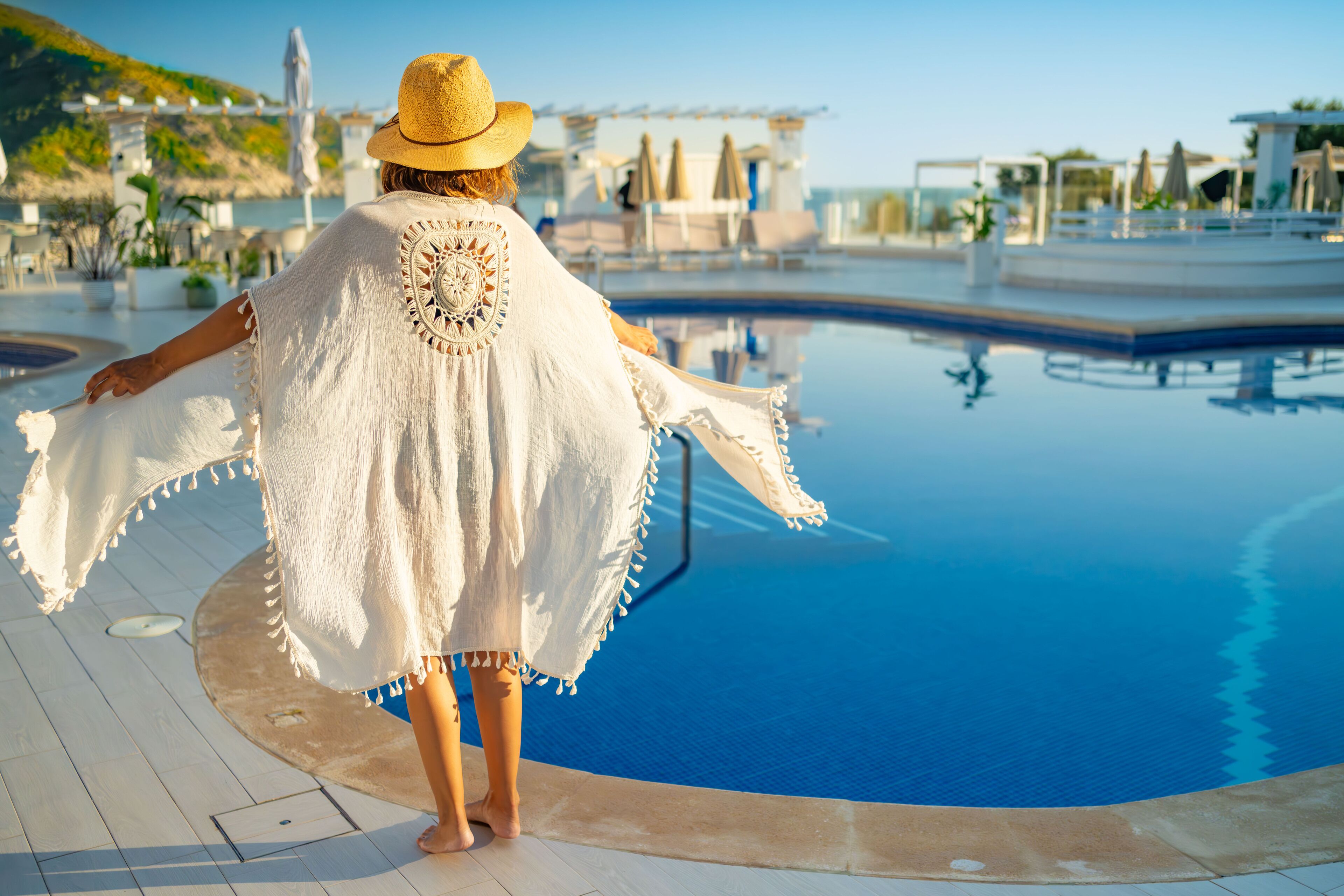 Indoor pool, open 10:00 AM to 8:00 PM, pool umbrellas, pool loungers