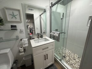 Bidet, towels, soap, toilet paper