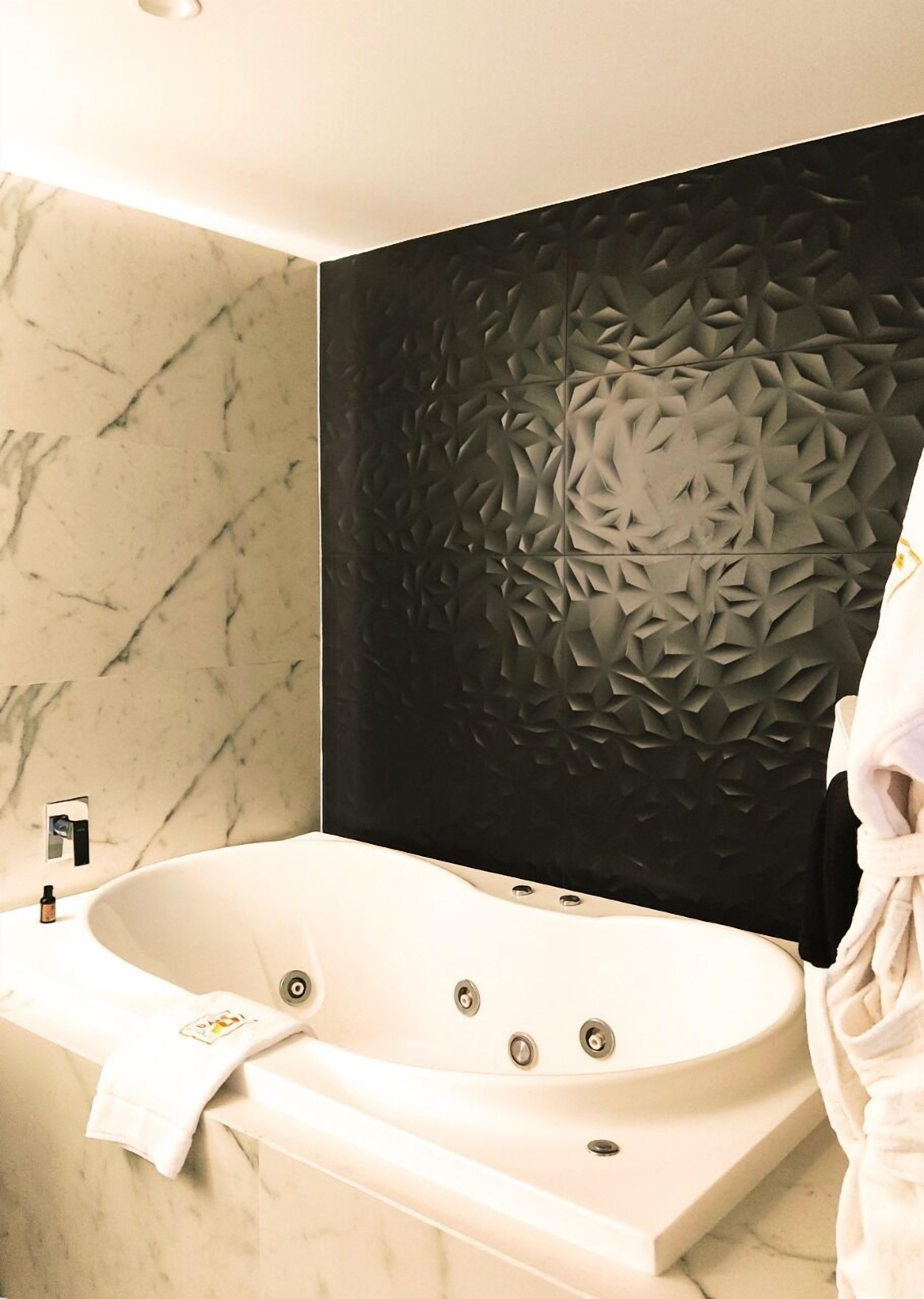 superior suite | bathroom | designer toiletries, hair dryer, towels, soap