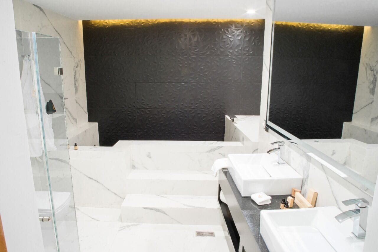 suite, private pool | bathroom | designer toiletries, hair dryer, towels, soap