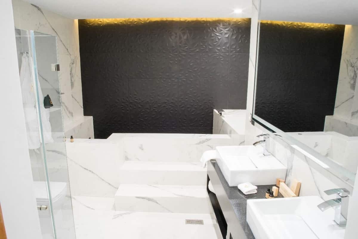 suite, private pool | bathroom | designer toiletries, hair dryer, towels, soap