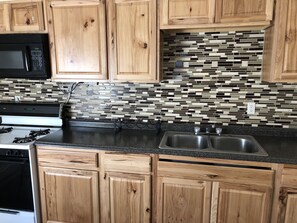 Frigorifero, microonde, forno, piano cottura