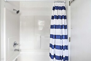 Shower, towels, soap, toilet paper