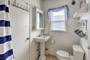 Shower, towels, soap, toilet paper