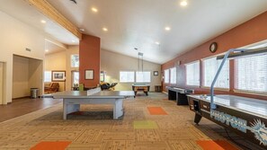 A spacious indoor area with a billiards table, a pool table, and a dartboard. - Pinetop | Couples Mountain Retreat | Pool + Hot Tub (Pinetop)