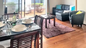Casa Deluxe | Área de sala de estar | Televisión de pantalla plana
