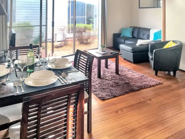 Enjoy meals in the dining area, relax in the seating area, and take in the view from the large windows.