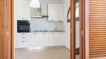 Apartment, 1 Bedroom (Casale del Sole) | Private kitchen | Oven, stovetop, dishwasher, electric kettle