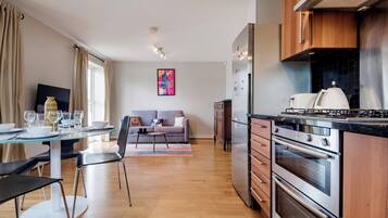 Basic Apartment, 1 Bedroom (2 Bedrooms) | Private kitchen | Fridge, microwave, oven, coffee/tea maker