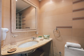 Hair dryer, towels, soap, shampoo