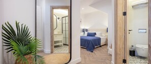 Suíte família, 2 quartos, vista para o mar, de frente para o mar | Roupas de cama premium, cofres nos quartos, escrivaninha