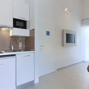 Fridge, microwave, toaster, cookware/dishes/utensils