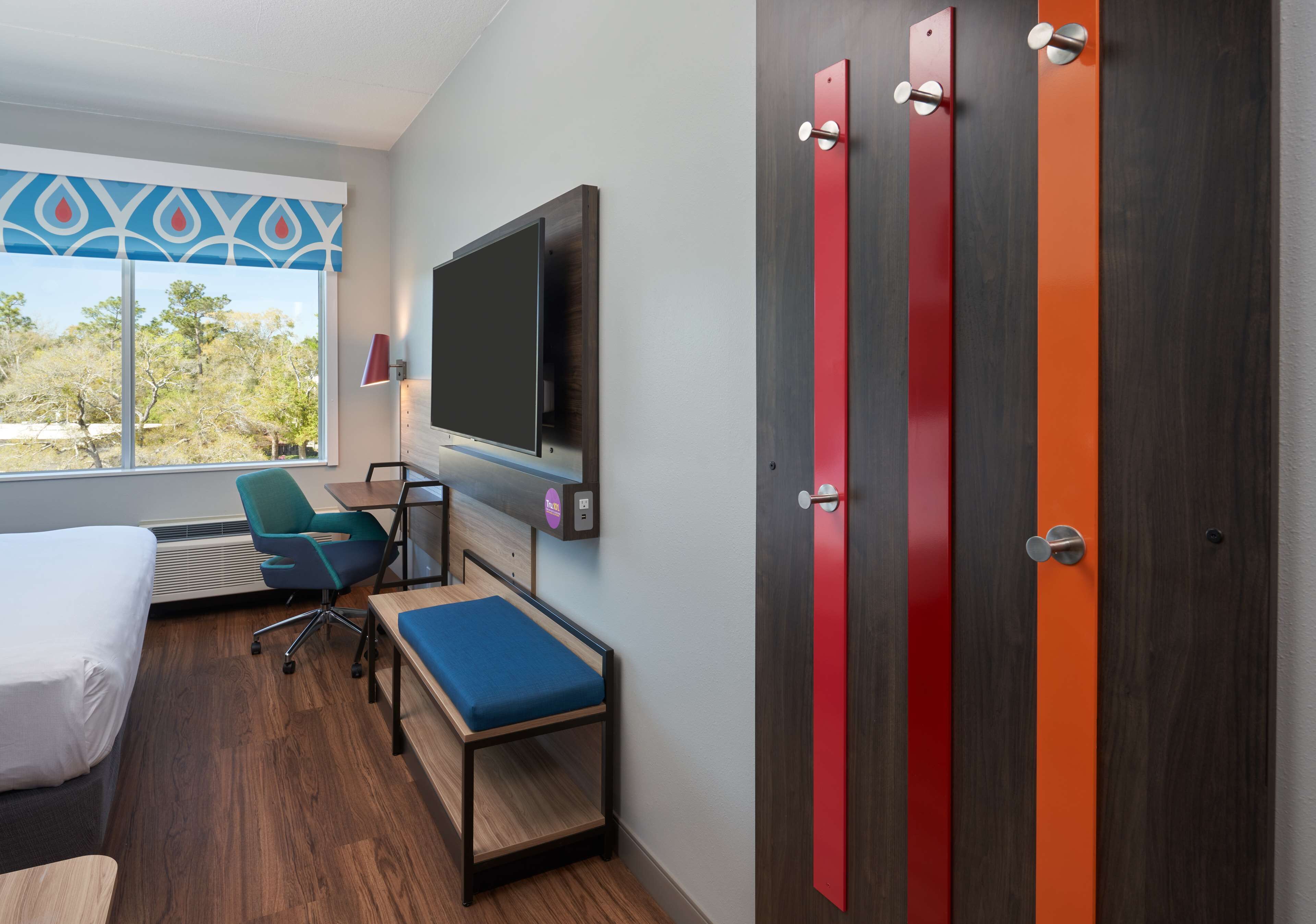 desk, laptop workspace, blackout curtains, iron/ironing board