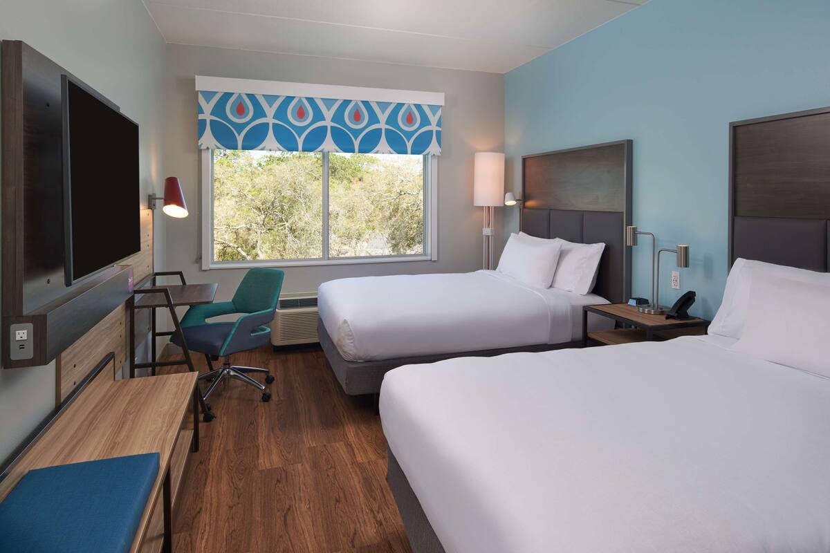 desk, laptop workspace, blackout curtains, iron/ironing board