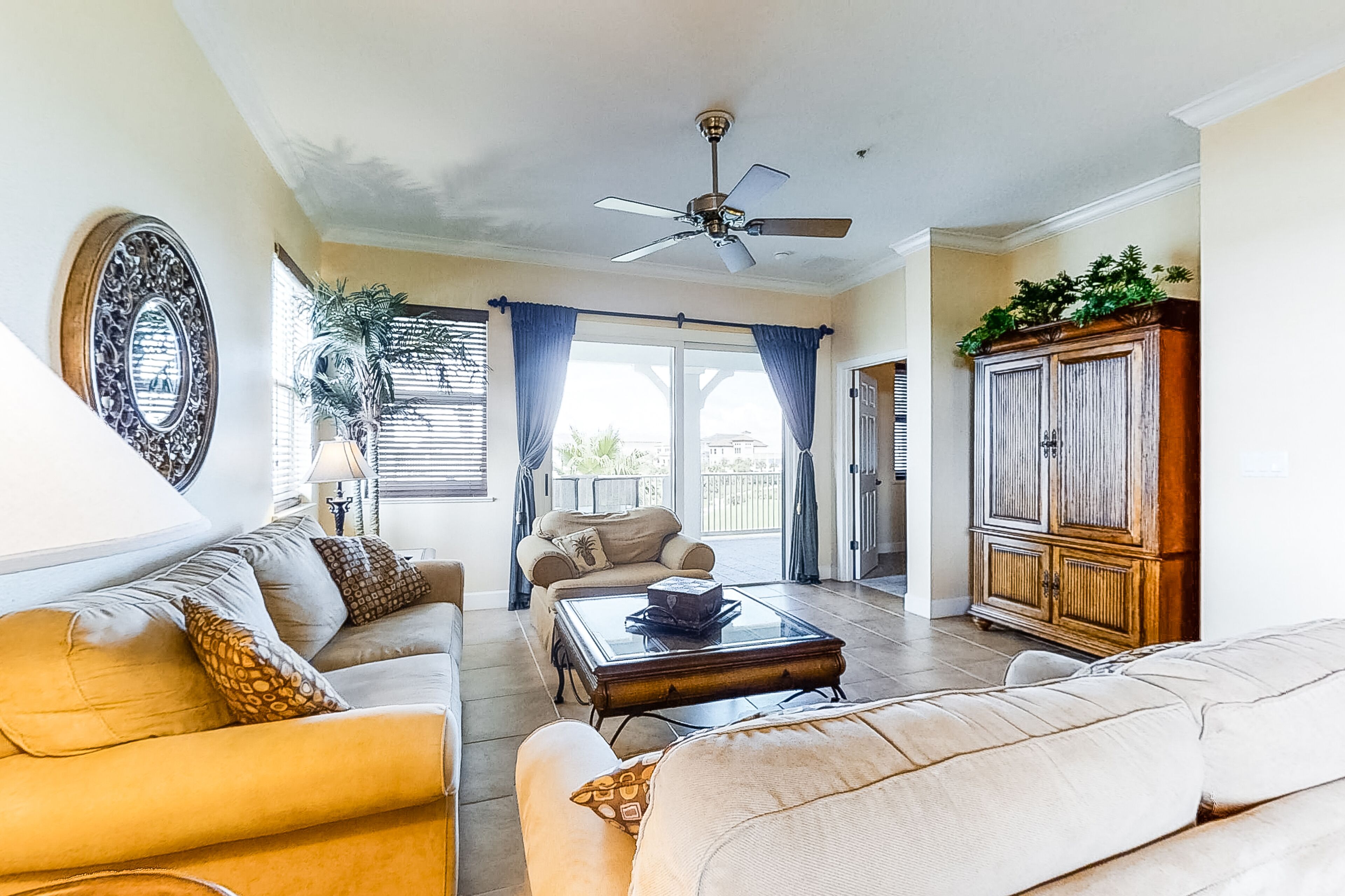 Tropical beach condo w/ a full kitchen, furnished balcony, shared pools, & more