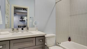 Hair dryer, towels, soap, shampoo