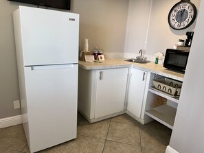 Fridge, microwave, coffee/tea maker, toaster