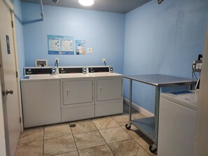 Convenient laundry facilities offer washing machines and a dryer for guest use.