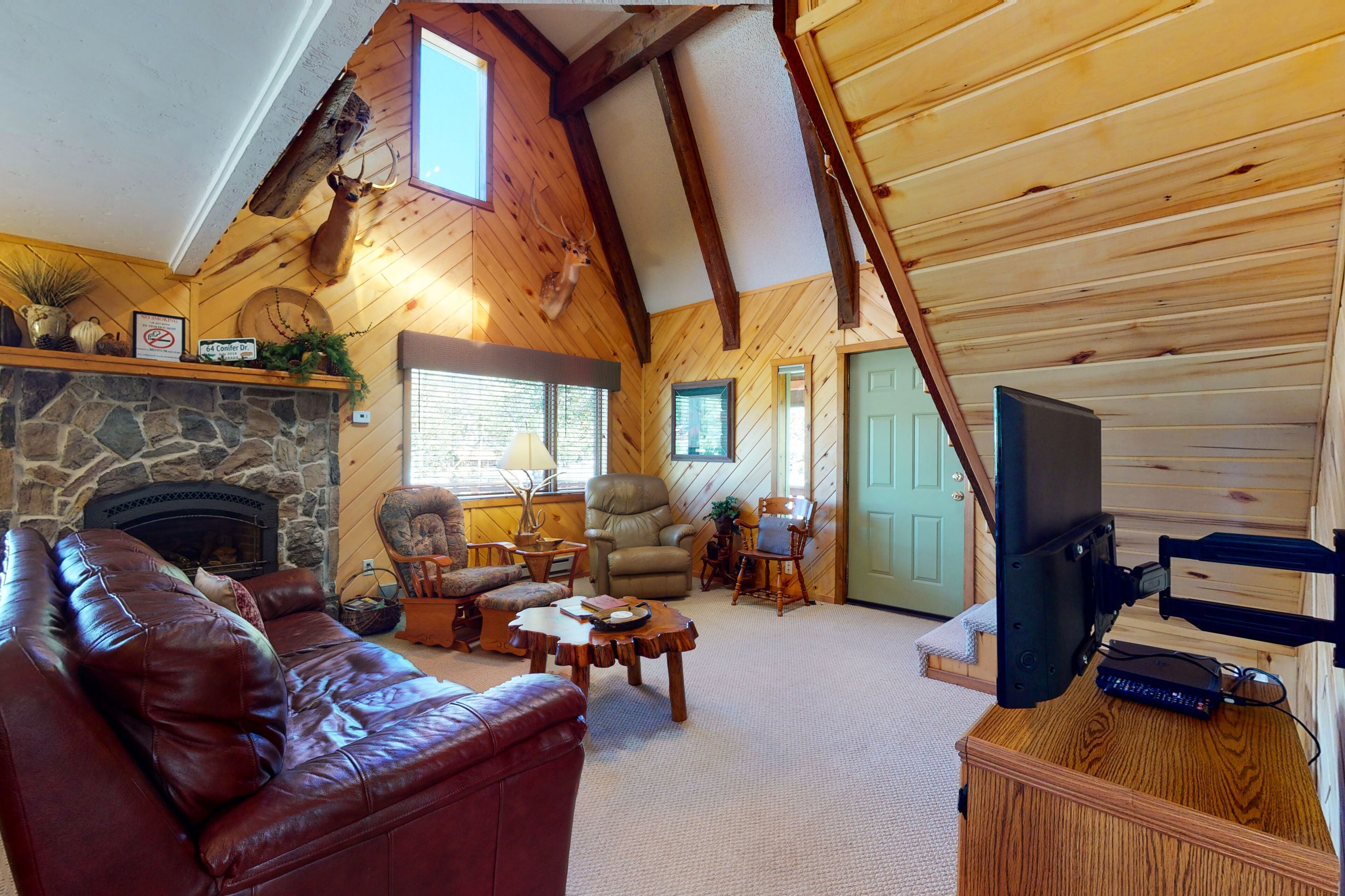 Cabin retreat with wrap-around porch, work spaces,