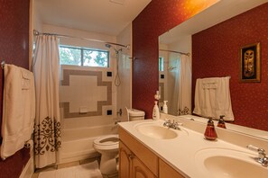 Combined shower/bathtub, hair dryer, towels, soap