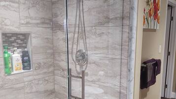 Bathtub, jetted bath, hair dryer, towels