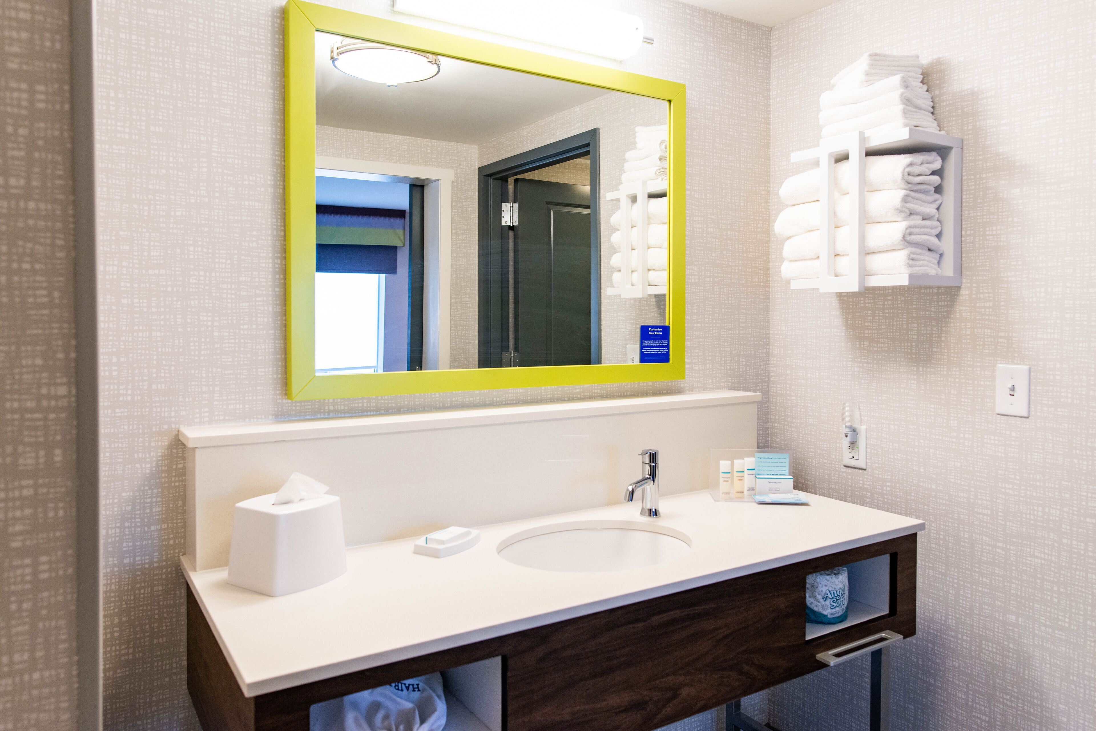 hair dryer, towels, soap, shampoo