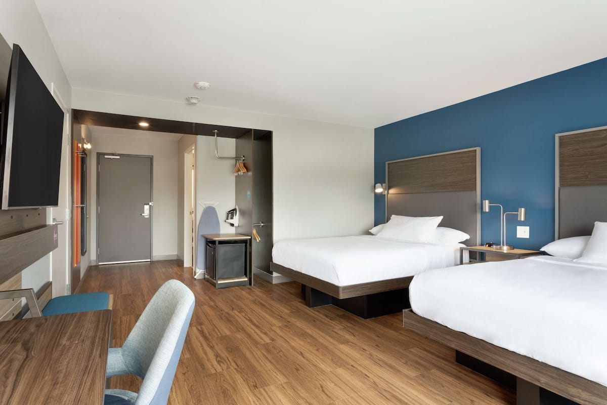 desk, laptop workspace, blackout curtains, iron/ironing board